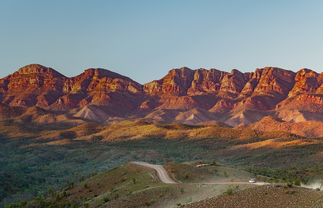 A 4WD bustling along dirt road headed toward Razorback Ridge in the Flinders Ranges and Outback 
