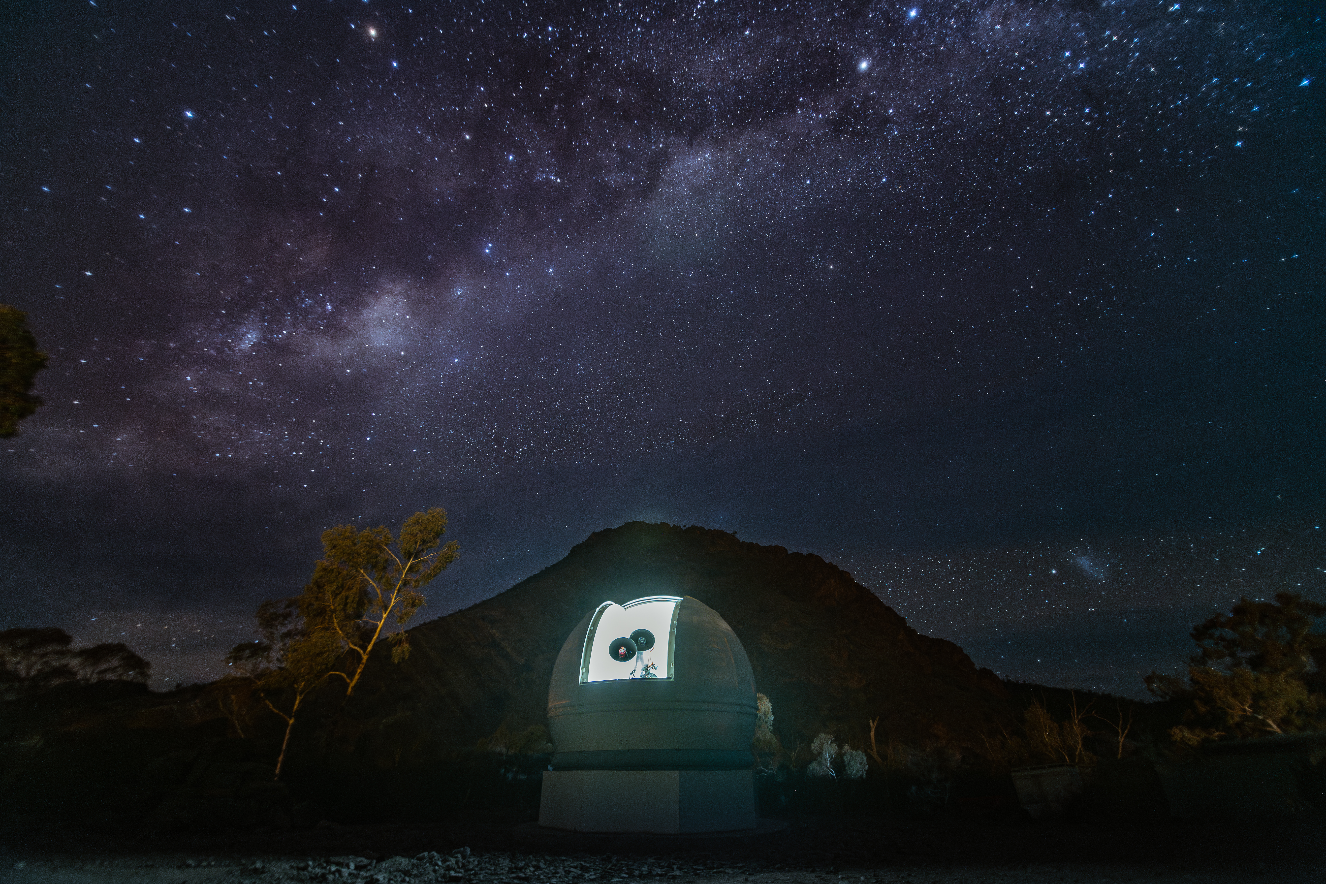 a telescope looking out to the night sky